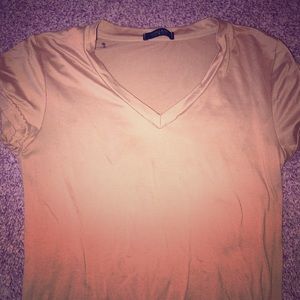 A Pink Cream Colored Shirt